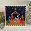 Nativity scene Christmas card on mantlepiece