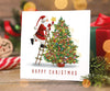 Santa dressing the tree Christmas cards (10 pack)