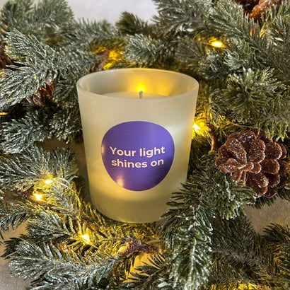 Candle in a Christmas wreath