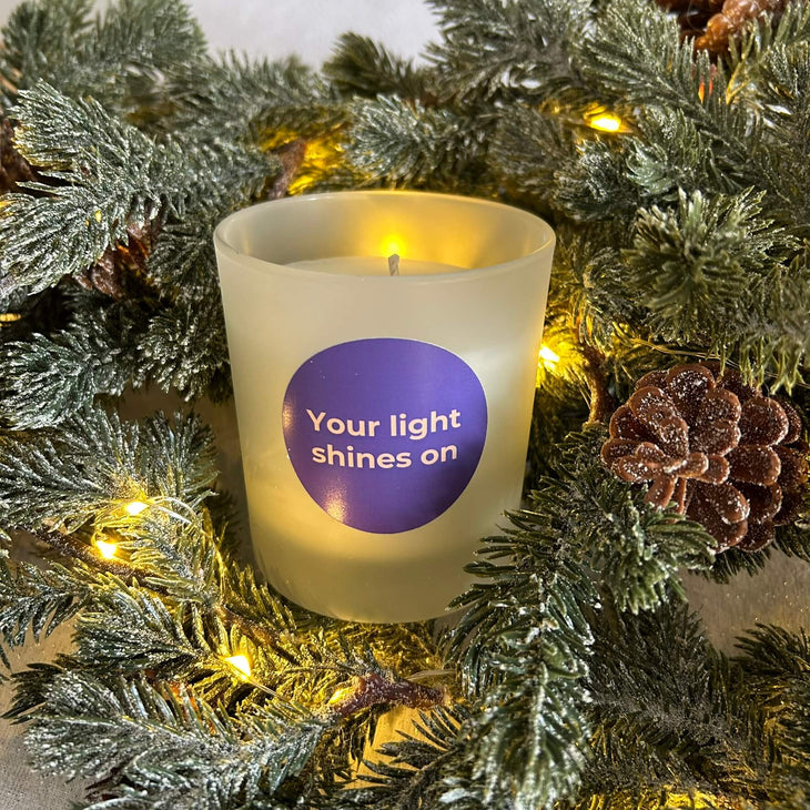 Candle in a Christmas wreath