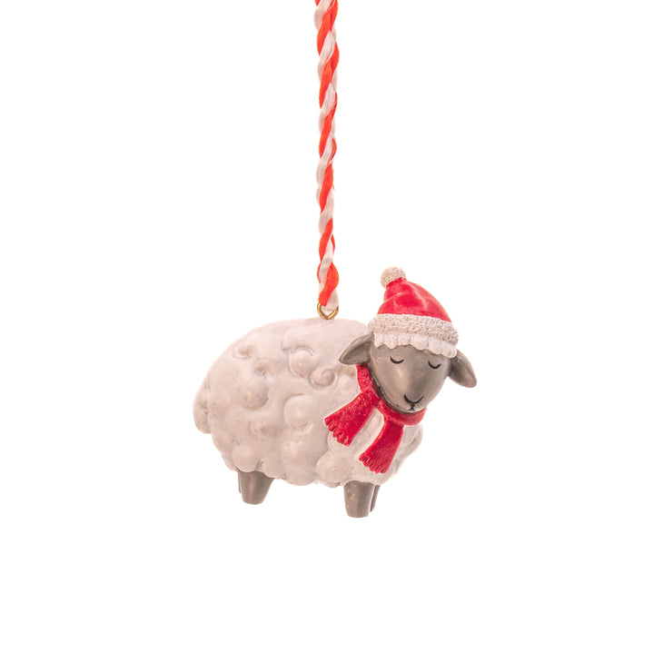 1 sheep decoration with red woolly hat and red scarf