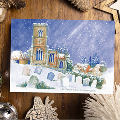 UK Charity Christmas card featuring - a church in a snow-covered landscape