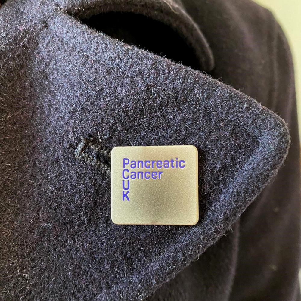 Pancreatic Cancer UK logo pin badge